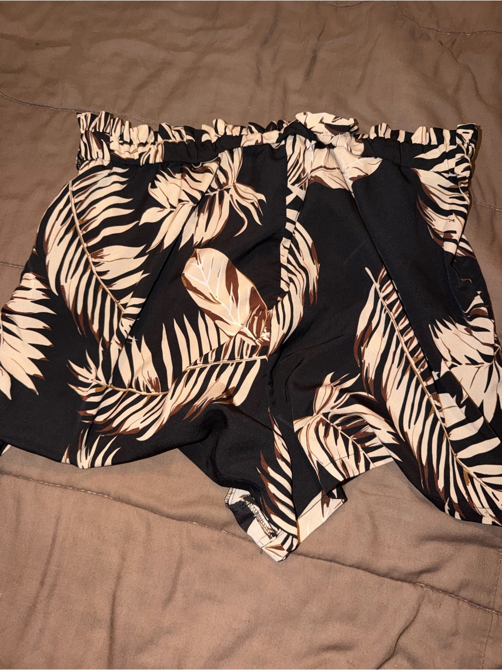 SHEIN Black Shorts with Beige Tropical Leaf Print